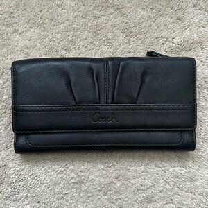 Black leather coach wallet. Excellent condition